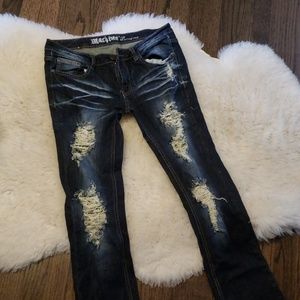 Machine Distressed Dark Denim Bootcut Jeans
